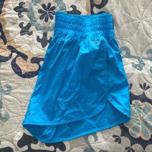 PINK ACTIVE lined running shorts, size M, bright blue color